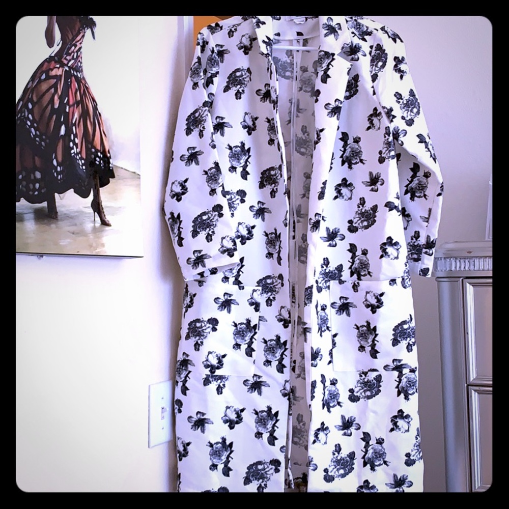 Medium  black and white  jacket.